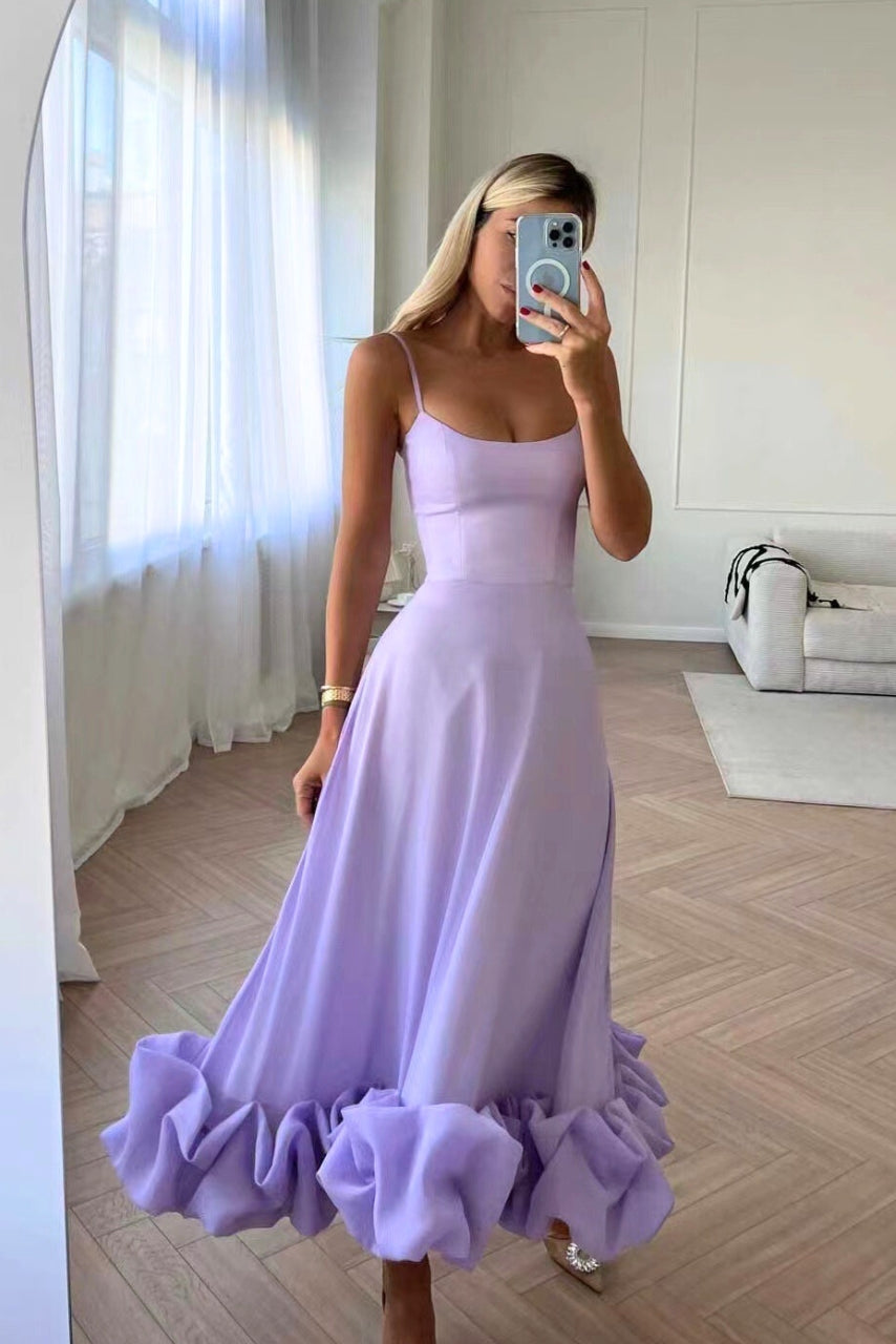 Flowing midi dress for women with a U-neck and ruffled hem