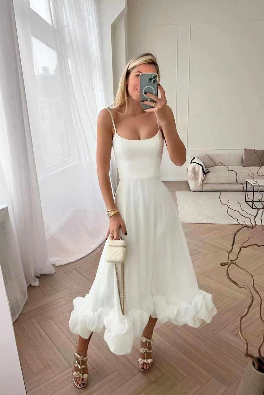 Flowing midi dress for women with a U-neck and ruffled hem