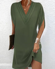 Women's dress with V-neck, short sleeves, and ruffle details