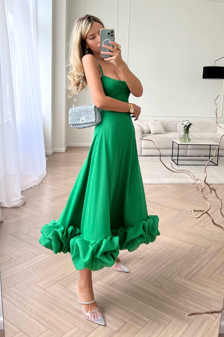 Flowing midi dress for women with a U-neck and ruffled hem