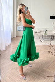 Flowing midi dress for women with a U-neck and ruffled hem