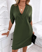 Women's dress with V-neck, short sleeves, and ruffle details