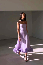 Flowing midi dress for women with a U-neck and ruffled hem