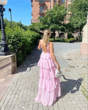 Maxi dress for women with ruffles and back cutout as well as halter neckline