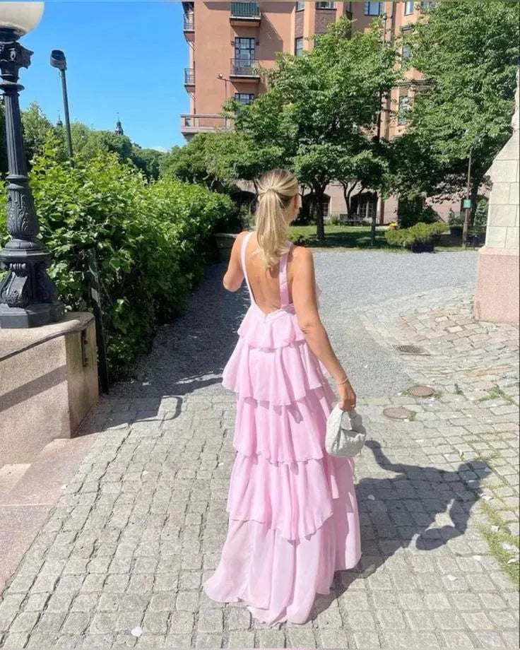 Maxi dress for women with ruffles and back cutout as well as halter neckline