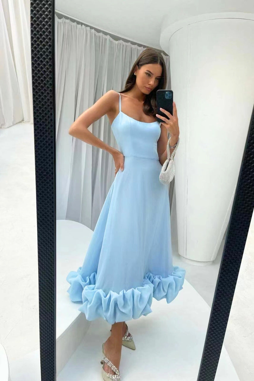 Flowing midi dress for women with a U-neck and ruffled hem