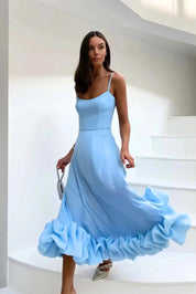 Flowing midi dress for women with a U-neck and ruffled hem