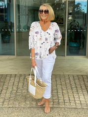 Damen-Bluse mit Knopfleiste und floralem Muster