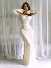 Women's maxi dress with long sleeves and flared skirt