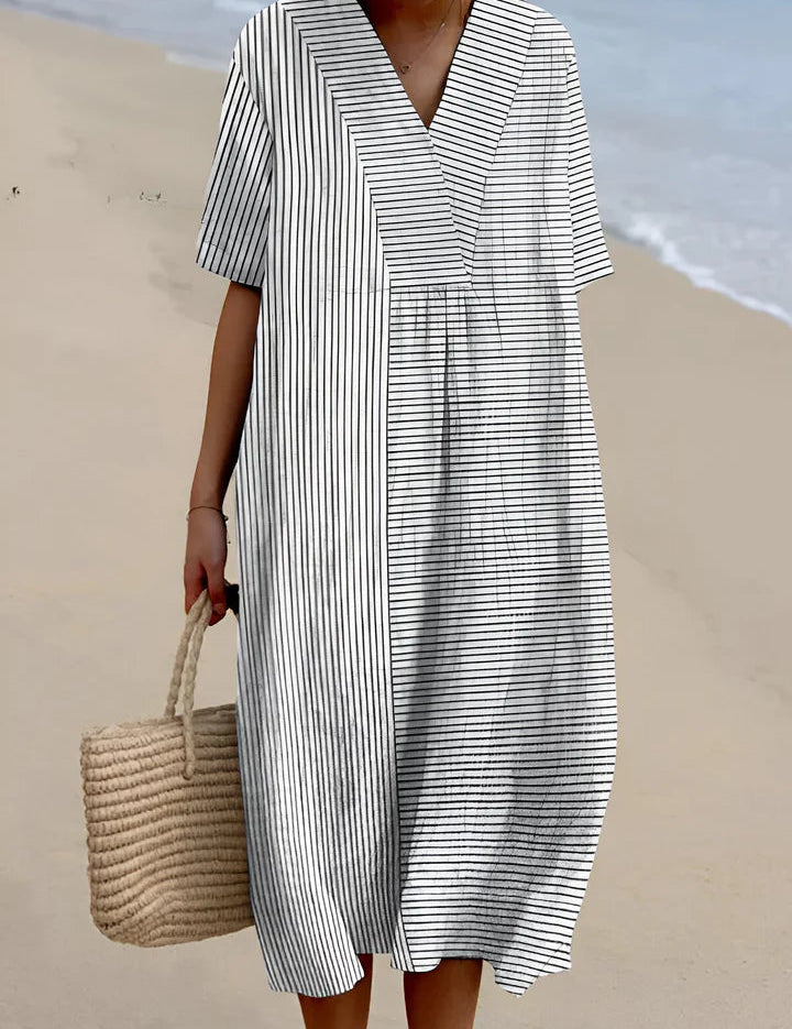 Damen-Midikleid_mit_V-Ausschnitt_und_modernem_Muster__4.jpg