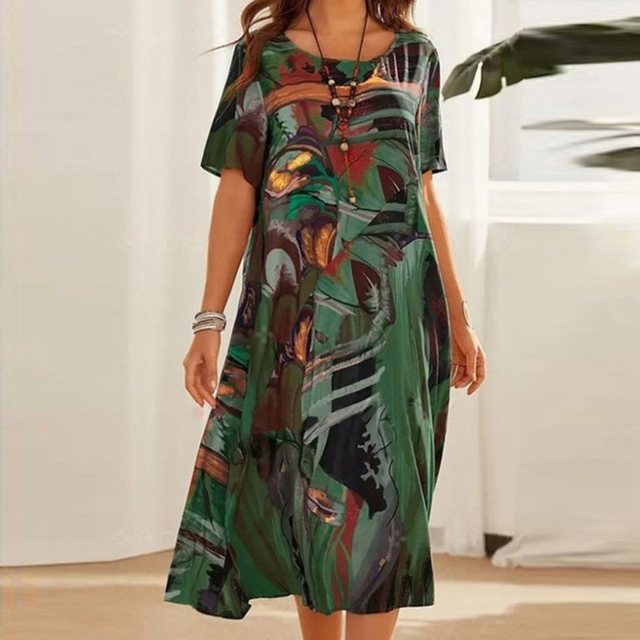 Damenkleid_mit_Rundhalsausschnitt_und_abstraktem_Muster__4.png