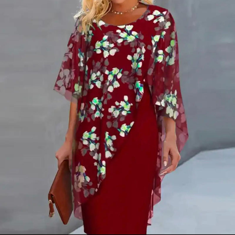 Damenkleid_mit_Rundhalsausschnitt_und_floralem_Muster__2.jpg