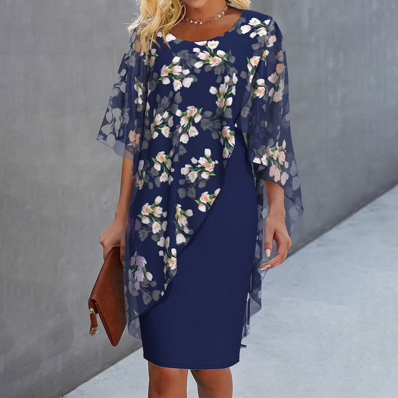 Damenkleid_mit_Rundhalsausschnitt_und_floralem_Muster__3.jpg