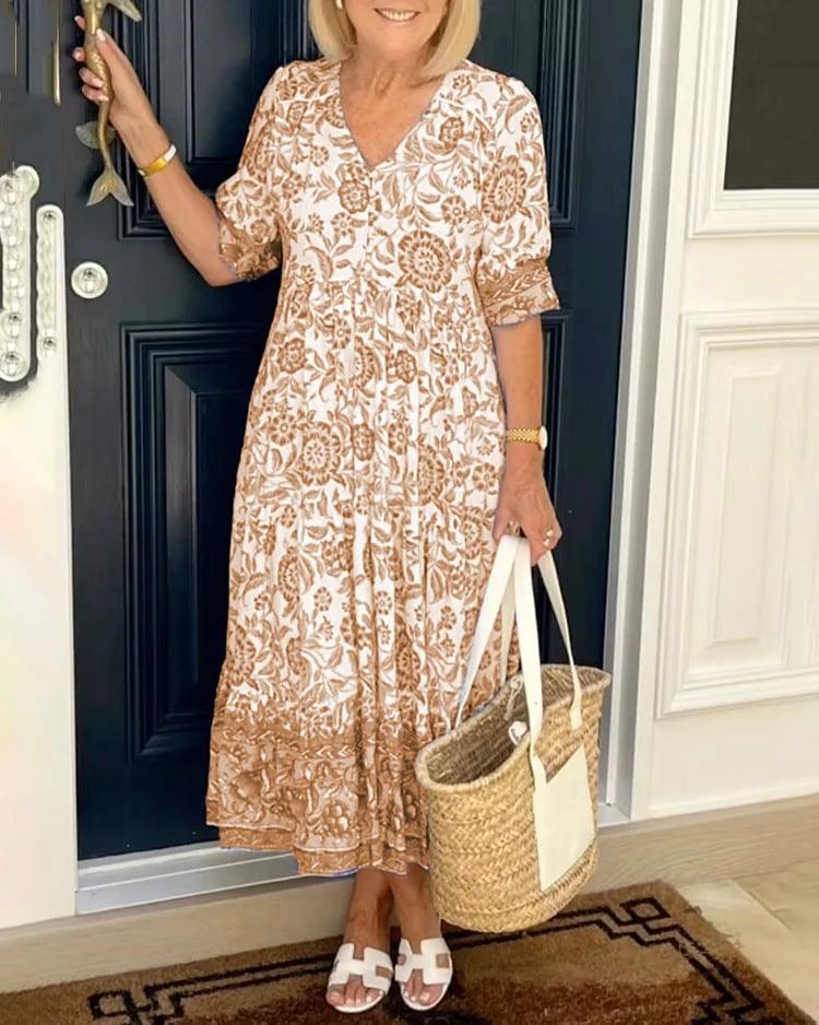 Women's dress with V-neck and elasticated waistband