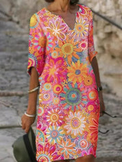 Women's dress with V-neck and short sleeves