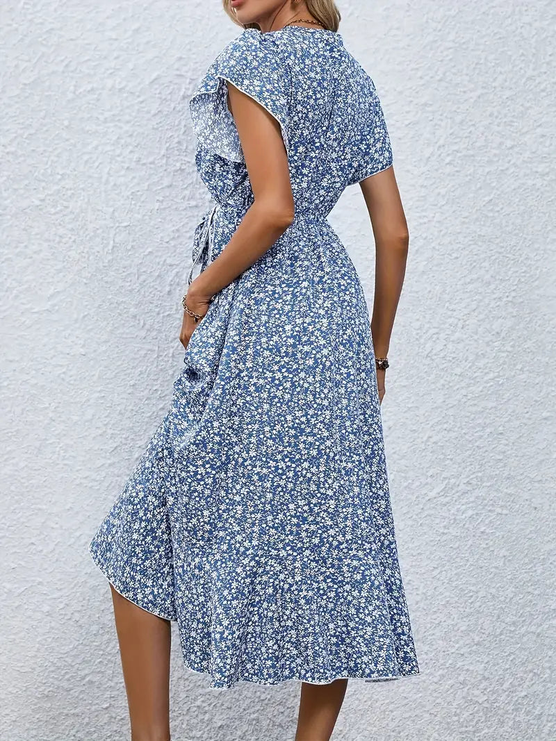 Women's dress with wrap closure and tie belt