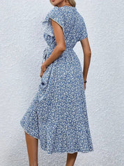 Women's dress with wrap closure and tie belt