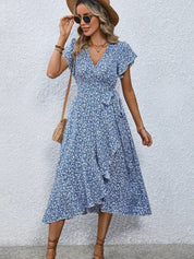 Women's dress with wrap closure and tie belt