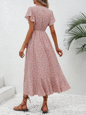 Women's dress with wrap closure and tie belt
