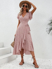 Women's dress with wrap closure and tie belt