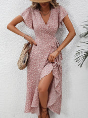 Women's dress with wrap closure and tie belt
