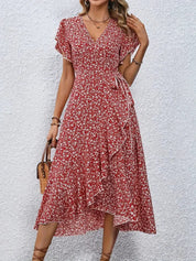 Women's dress with wrap closure and tie belt