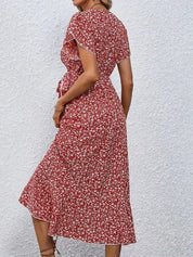 Women's dress with wrap closure and tie belt