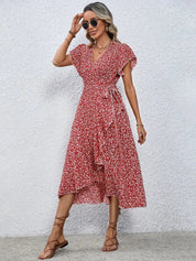 Women's dress with wrap closure and tie belt