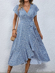 Women's dress with wrap closure and tie belt