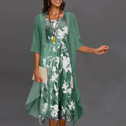 Two-piece women's summer dress with floral underdress and transparent overlay