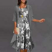 Two-piece women's summer dress with floral underdress and transparent overlay