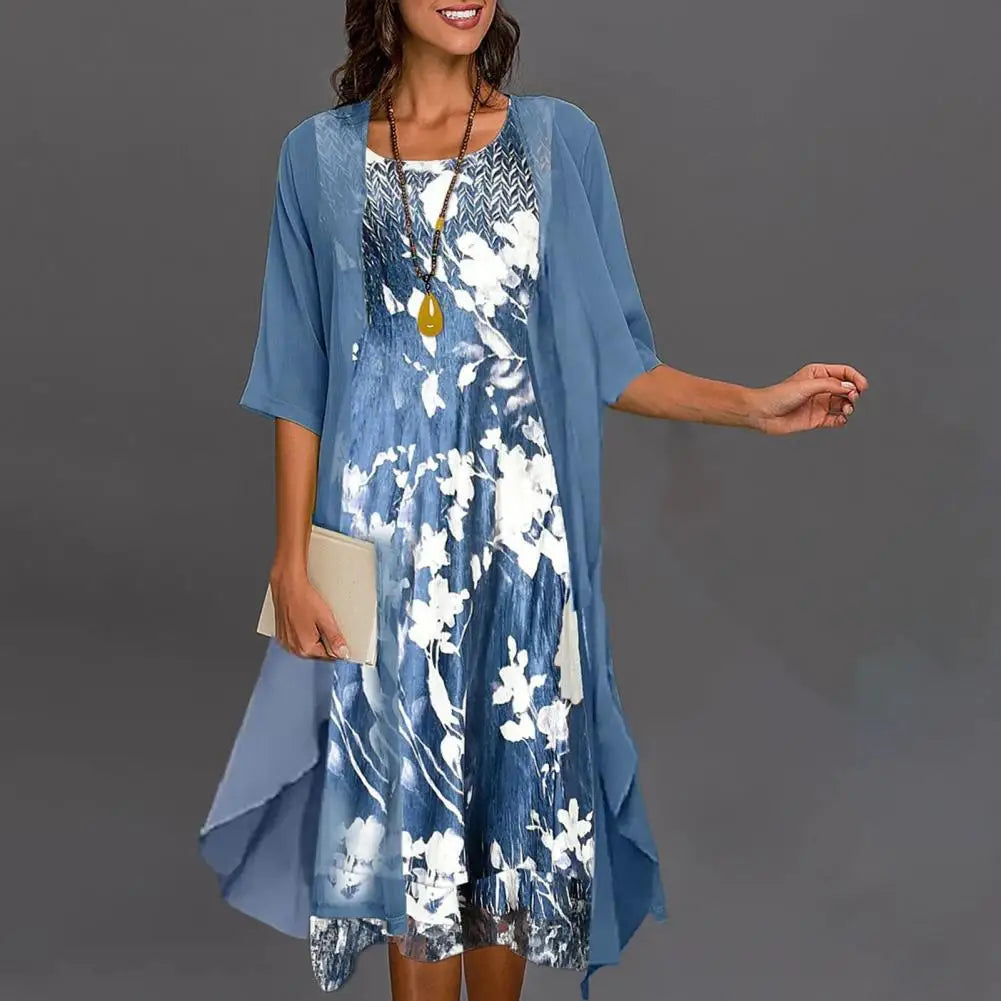 Two-piece women's summer dress with floral underdress and transparent overlay