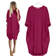 Women's casual dress with a round neckline and long sleeves