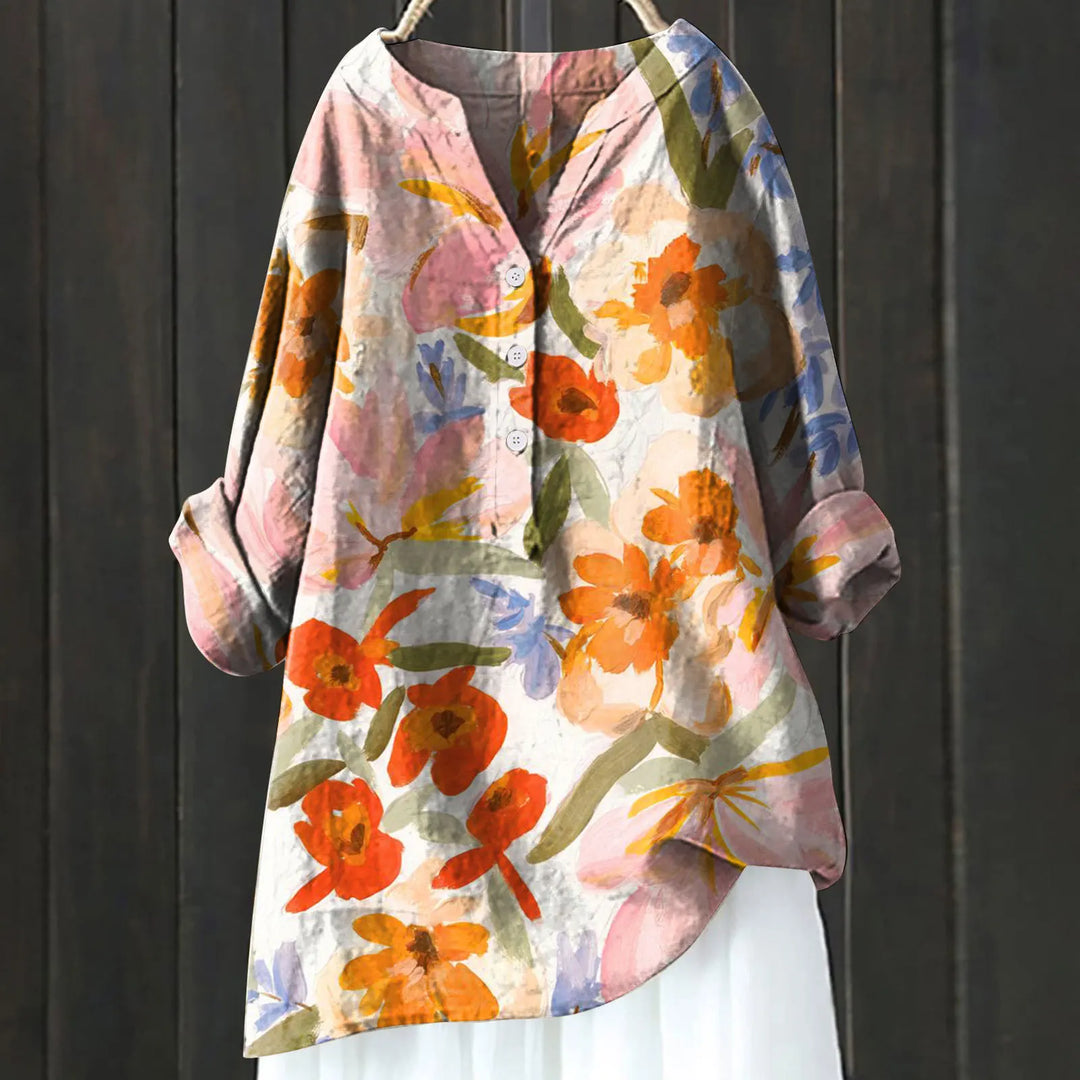 Women's casual shirt with Henley neckline and floral embroidery