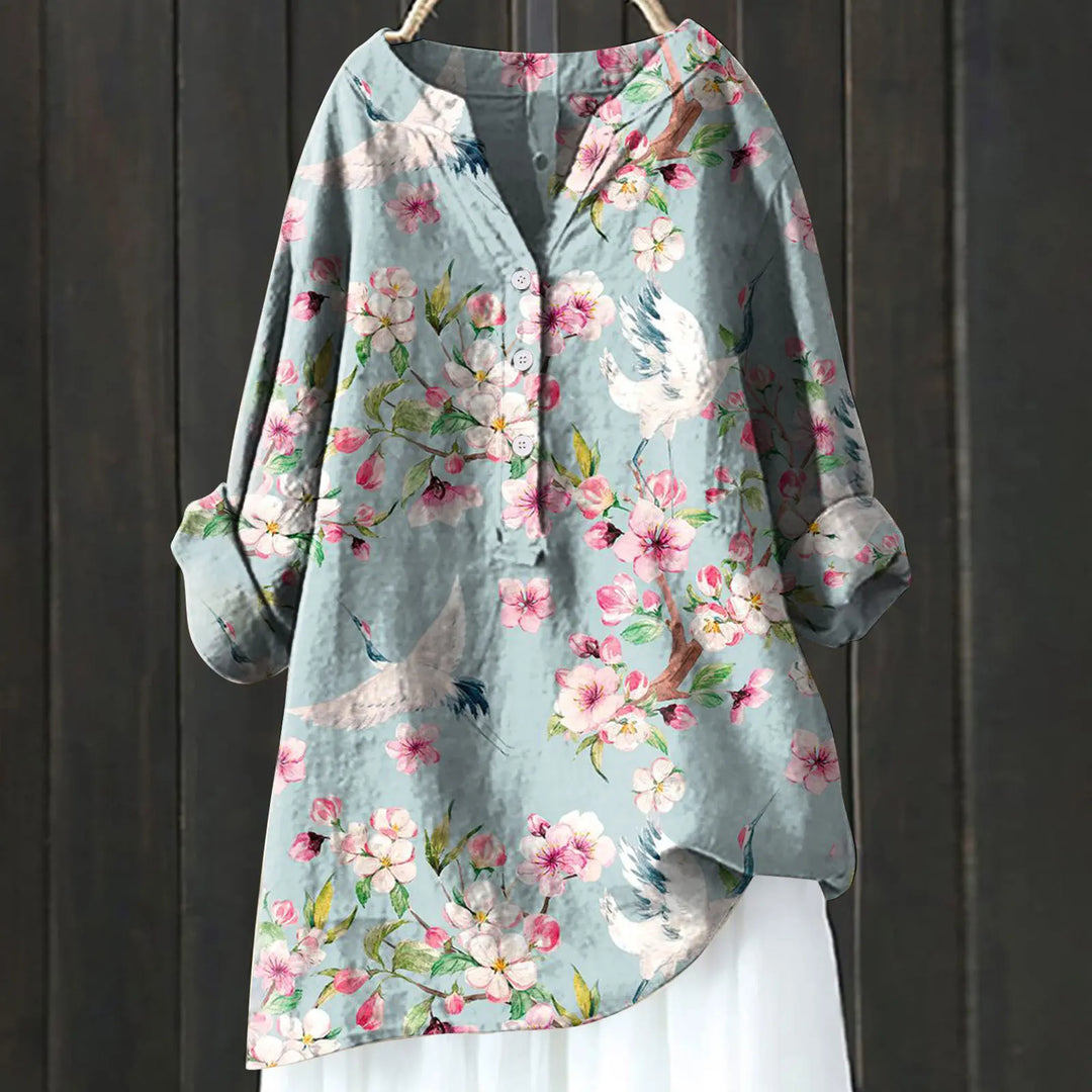 Women's casual shirt with Henley neckline and floral embroidery