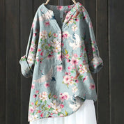 Women's casual shirt with Henley neckline and floral embroidery