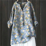 Women's casual shirt with Henley neckline and floral embroidery