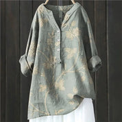 Women's casual shirt with Henley neckline and floral embroidery