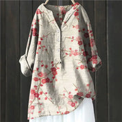Women's casual shirt with Henley neckline and floral embroidery