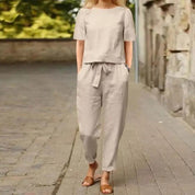 Women's Jumpsuit with Round Neck and Tie Belt