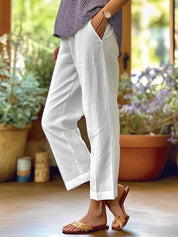 Women with side pockets and turn-up hems