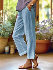 Women with side pockets and turn-up hems
