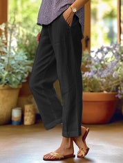 Women with side pockets and turn-up hems