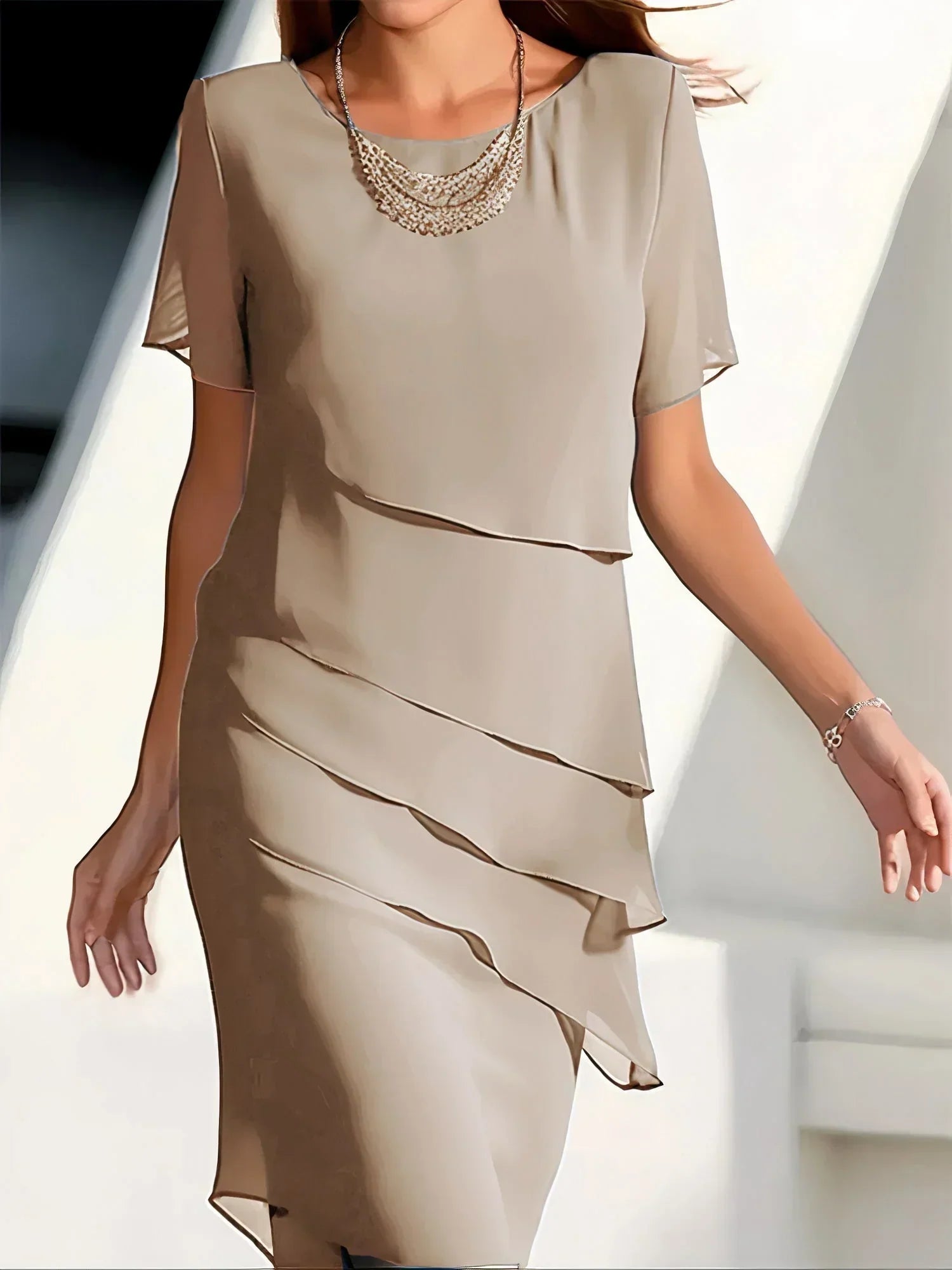 Women's layered dress with cascading fabric and short sleeves