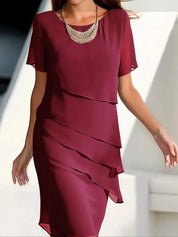 Women's layered dress with cascading fabric and short sleeves