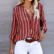 Striped long-sleeved women's blouse with V-neck and pocket