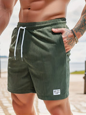 Herren-Badeshorts mit gerippter Struktur und Kordelzug in der Taille