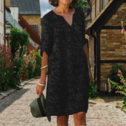 Knee-length summer dress for women with floral pattern and V-neck