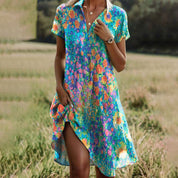 Short-sleeved women's summer dress with V-neck and prints