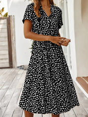 Women's short-sleeved dress with a round neckline and stitched hem